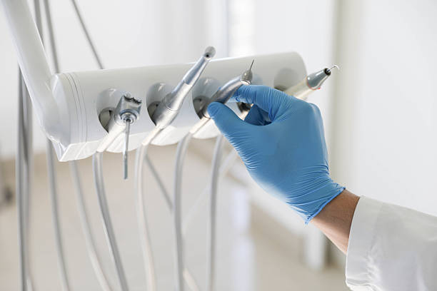 Professional Tooth Extraction technician working in Parkland, FL